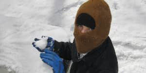 Jona gets ready to throw a snowball.