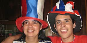 Jona and his aunt wearing silly hats.