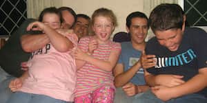 Jona, his brother, and their cousins with their parents.