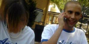 Jona and a friend sitting at a table in the quadrangle at Bob Jones Academy.