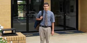 Jona stands in front of Bob Jones Academy.